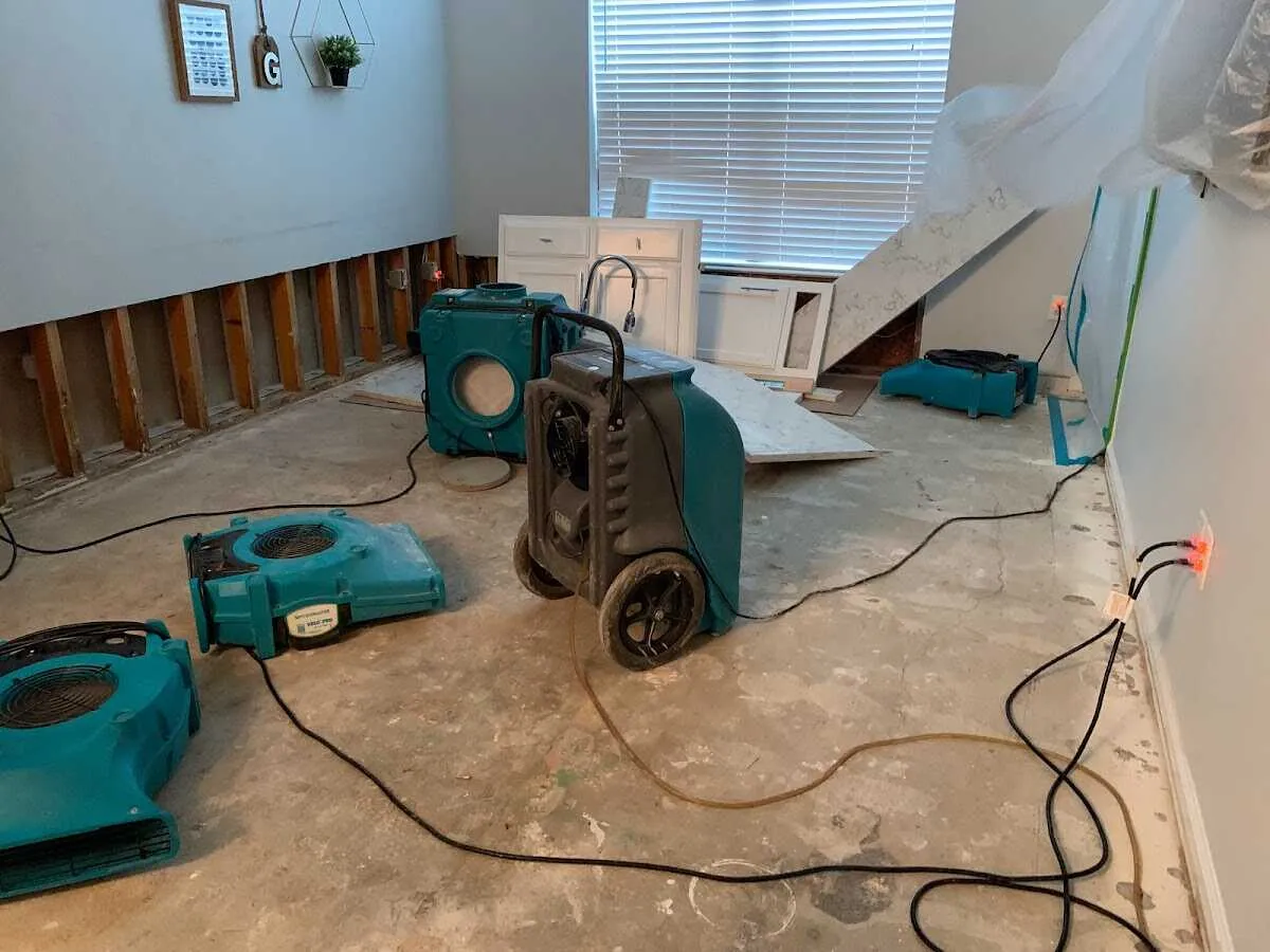 Dehumidifier in flood-cut room for Water Damage Restoration in Carlsbad